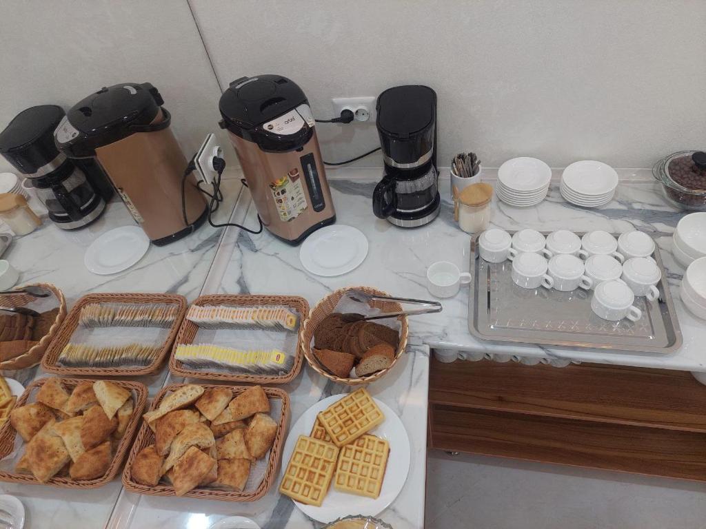 Variety of breakfast dishes at Jahongir Premium Hotel's buffet